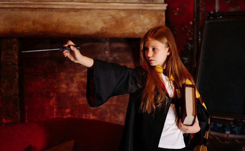 A Girl Practicing Her Wizard Skill with a Magic Wand